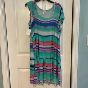 Beautiful colors. Sundress with pockets. New with tags. Size 1x
